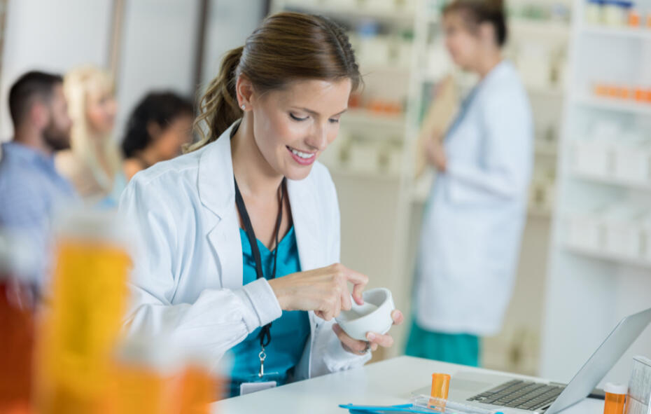Pharamacist talking to her patient